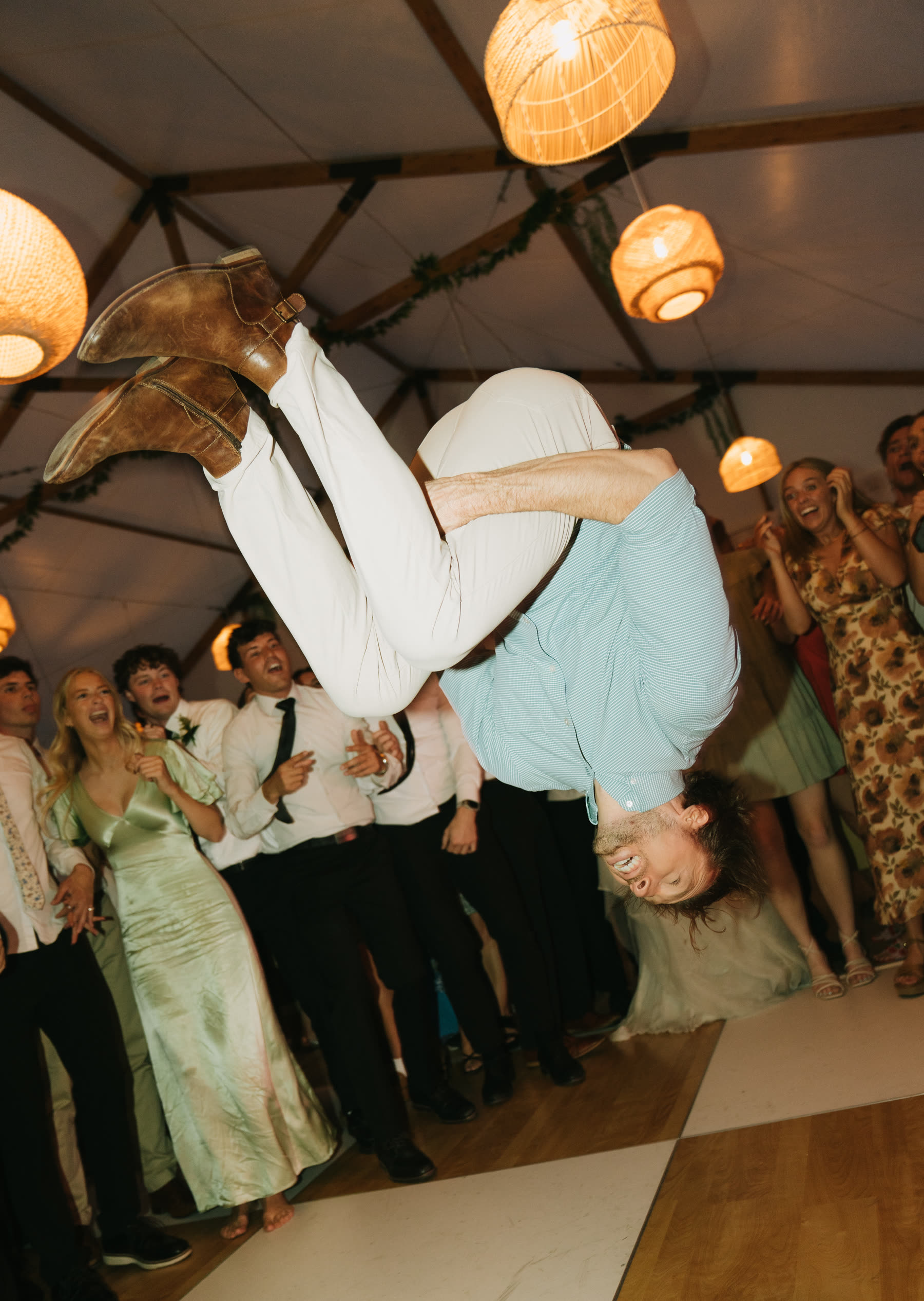 Guest doing a backflip on the dance floor
